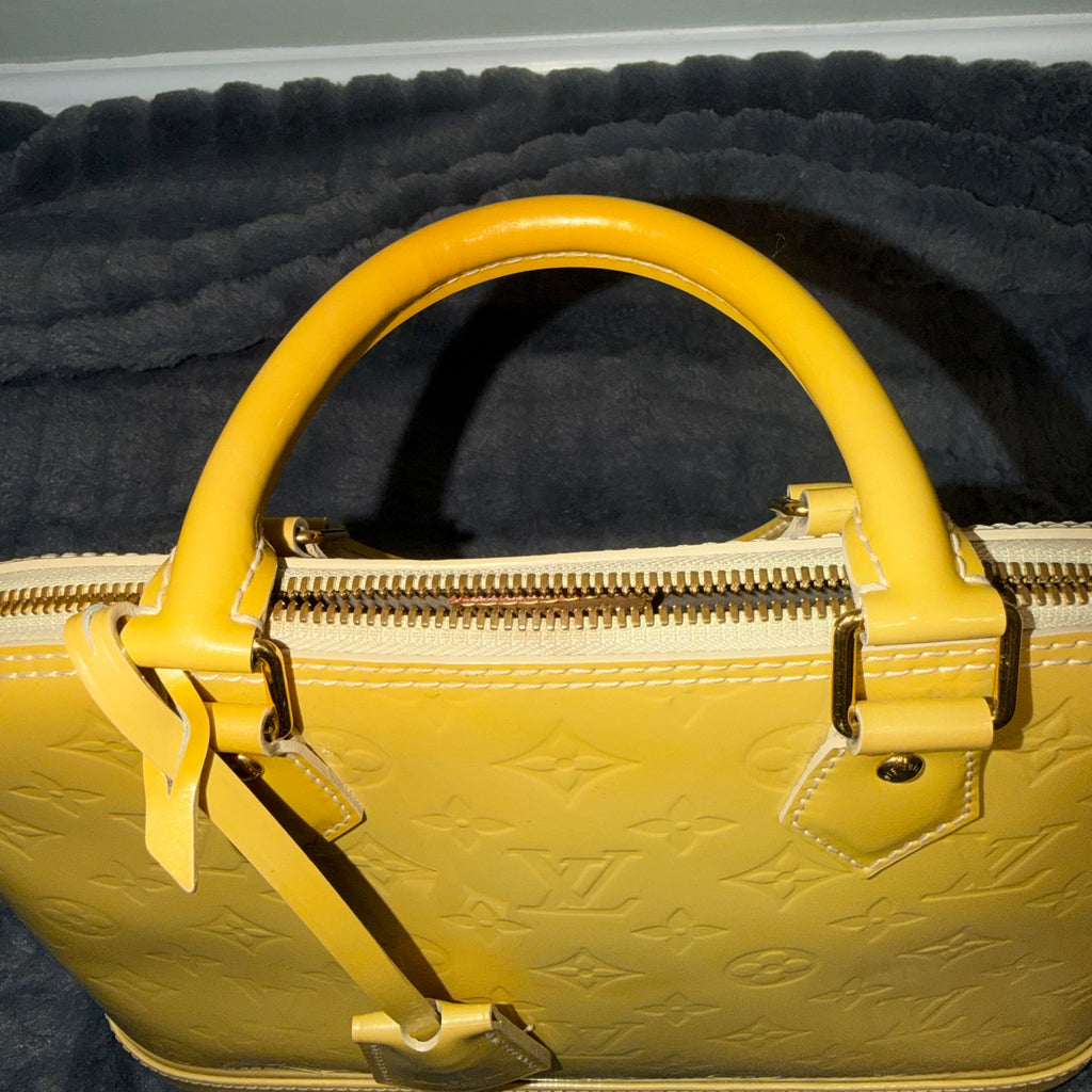 Louis Vuitton Alma yellow vernis