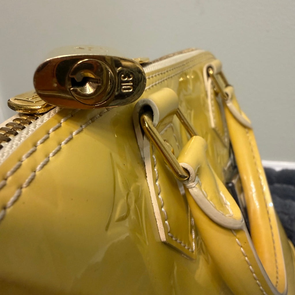 Louis Vuitton Alma yellow vernis
