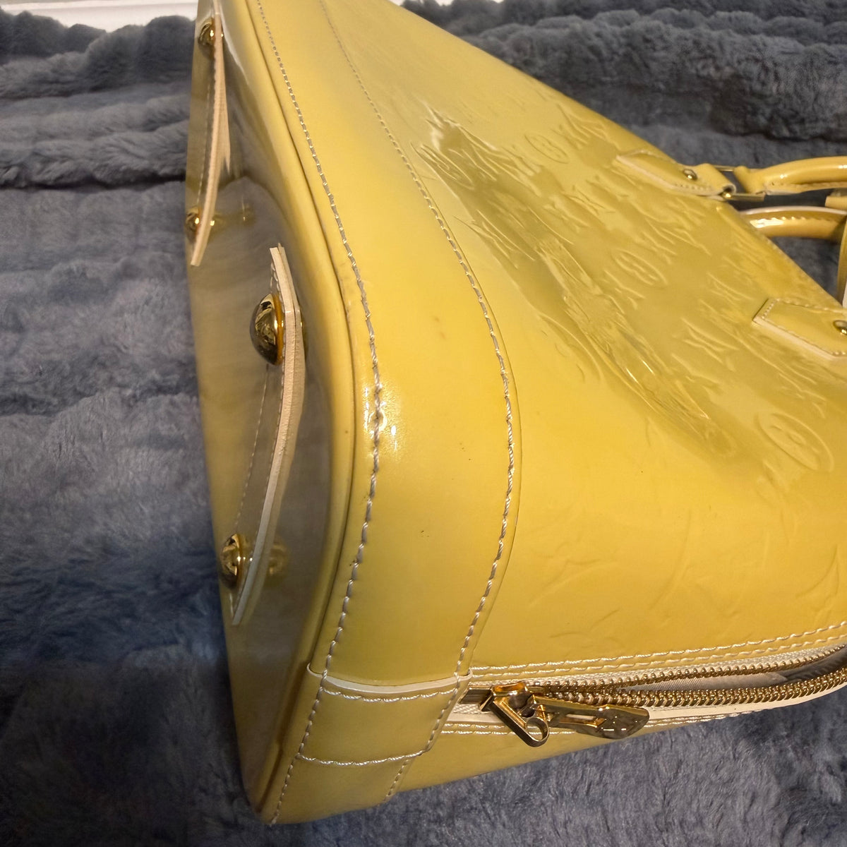 Louis Vuitton Alma yellow vernis