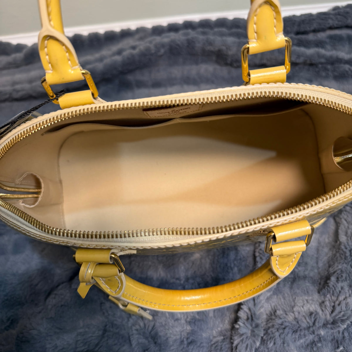 Louis Vuitton Alma yellow vernis