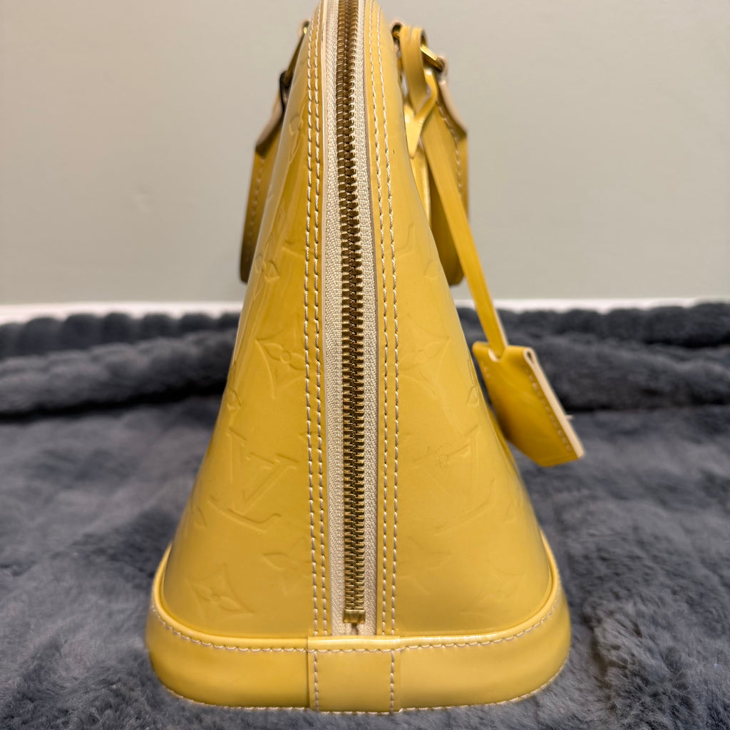 Louis Vuitton Alma yellow vernis