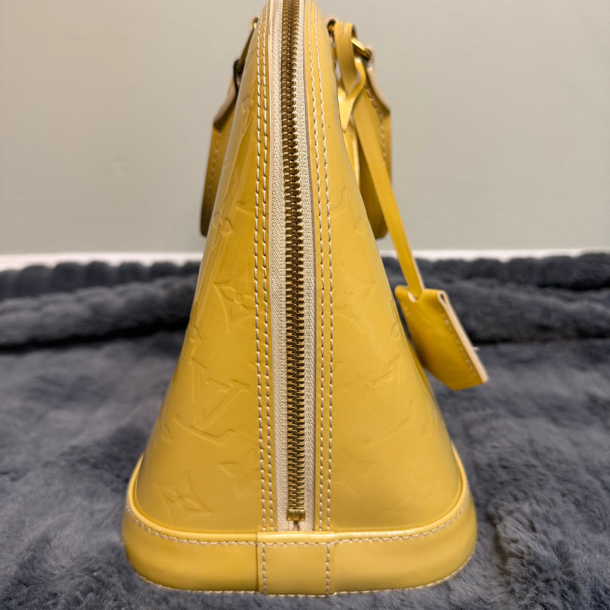 Louis Vuitton Alma yellow vernis