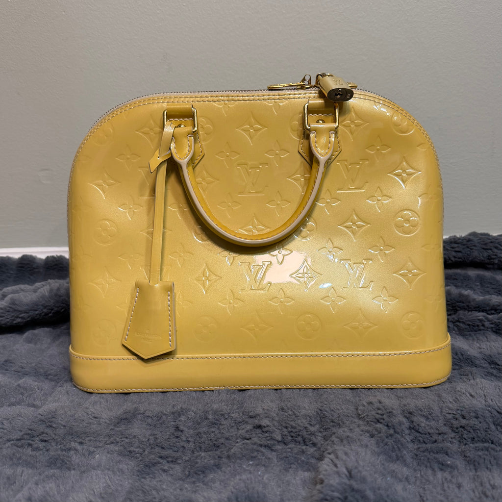Louis Vuitton Alma yellow vernis