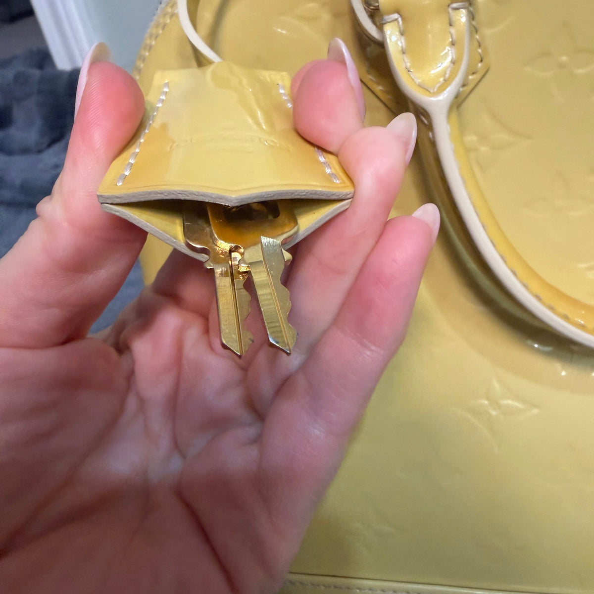Louis Vuitton Alma yellow vernis