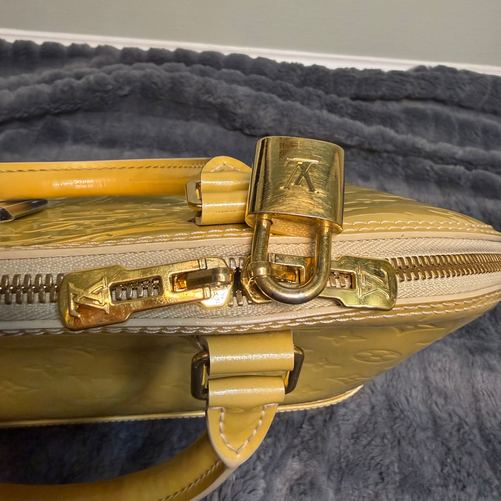 Louis Vuitton Alma yellow vernis