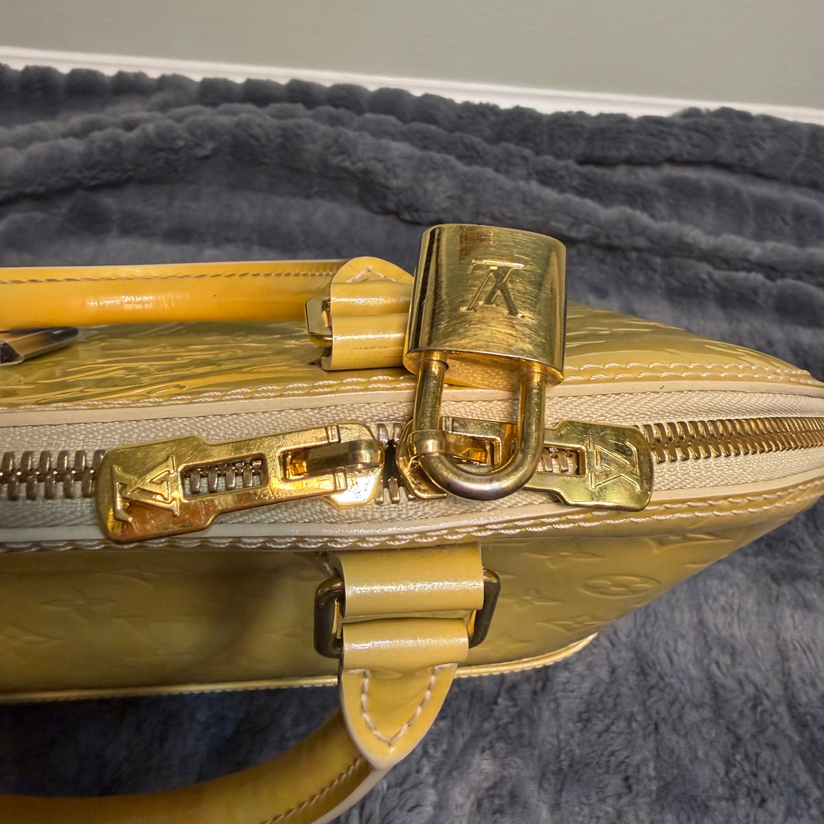 Louis Vuitton Alma yellow vernis