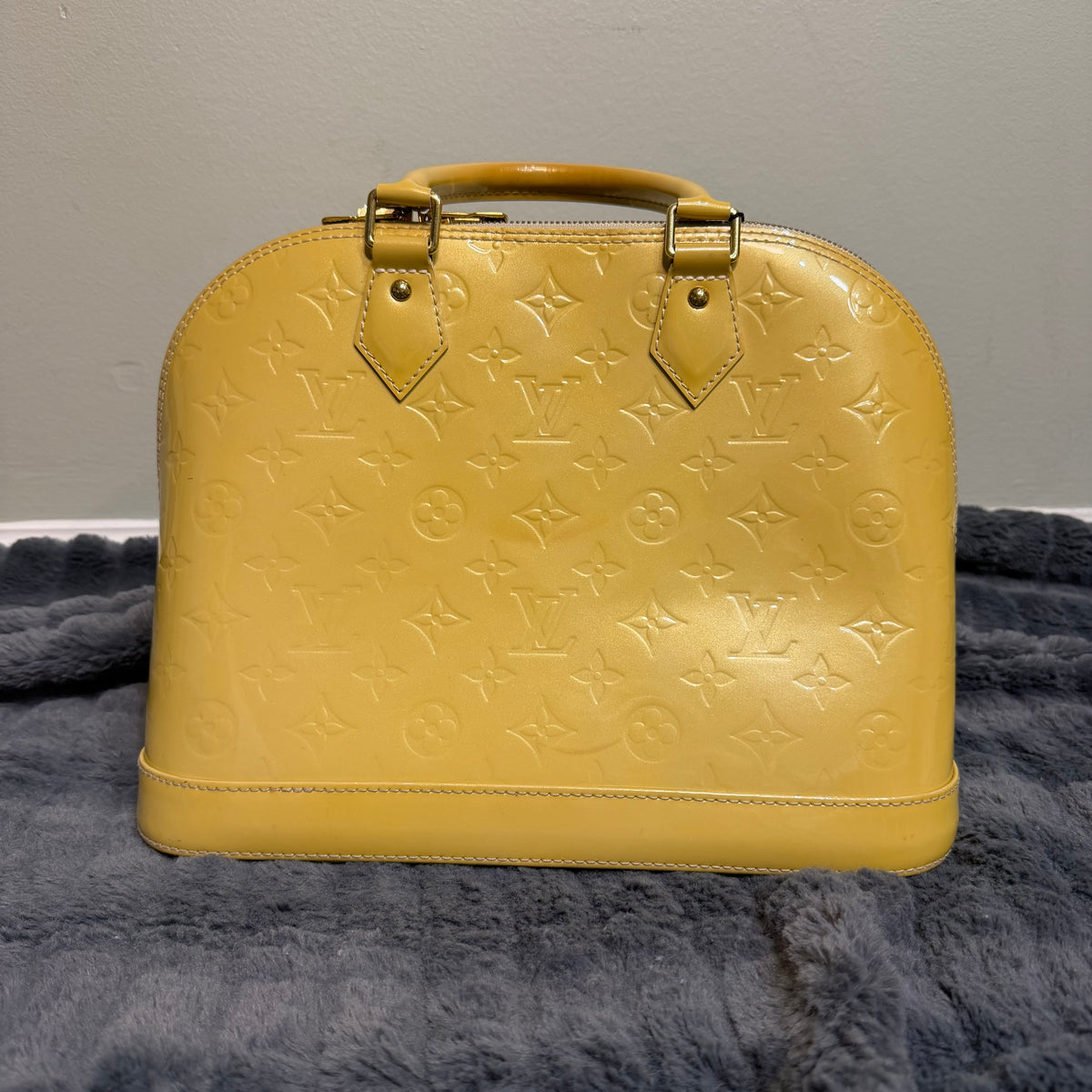 Louis Vuitton Alma yellow vernis